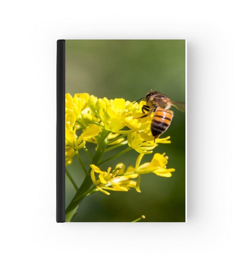 Agenda A bee in the yellow mustard flowers